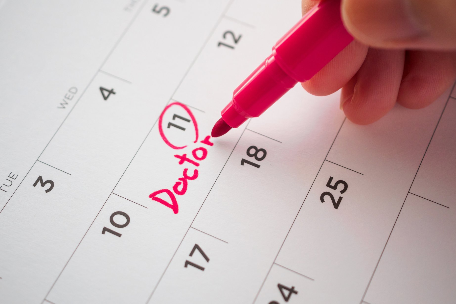 important doctor appointment schedule write on white calendar pa